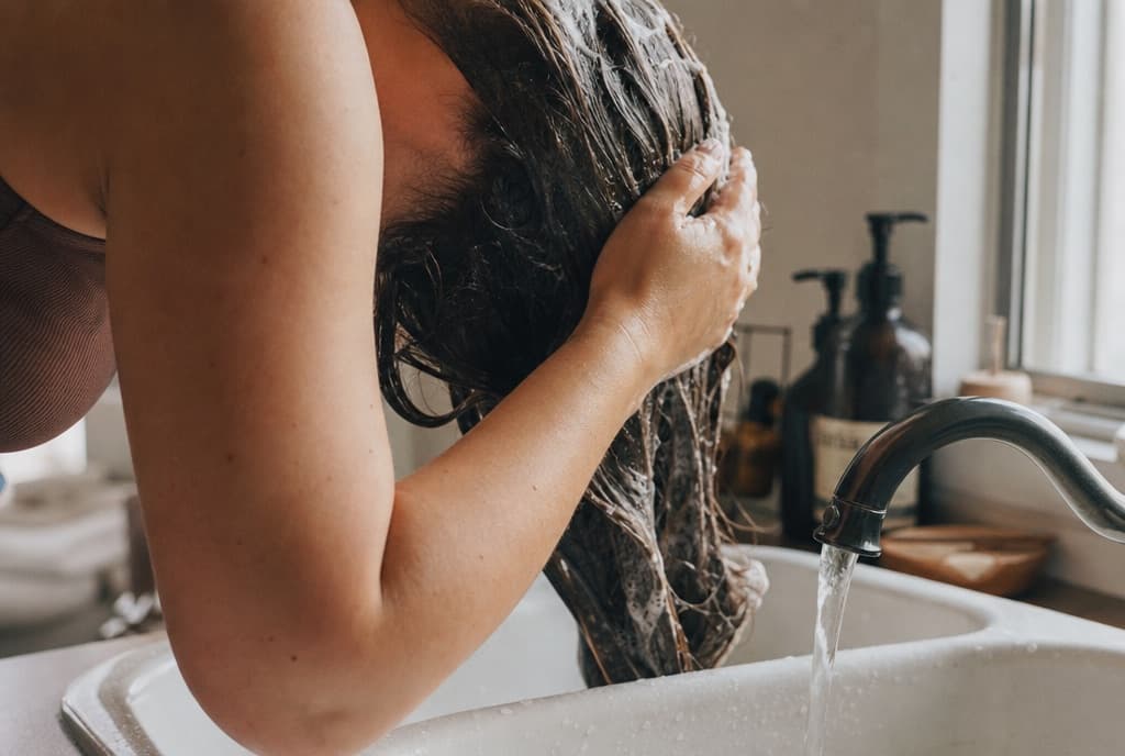 Person washing their hair
